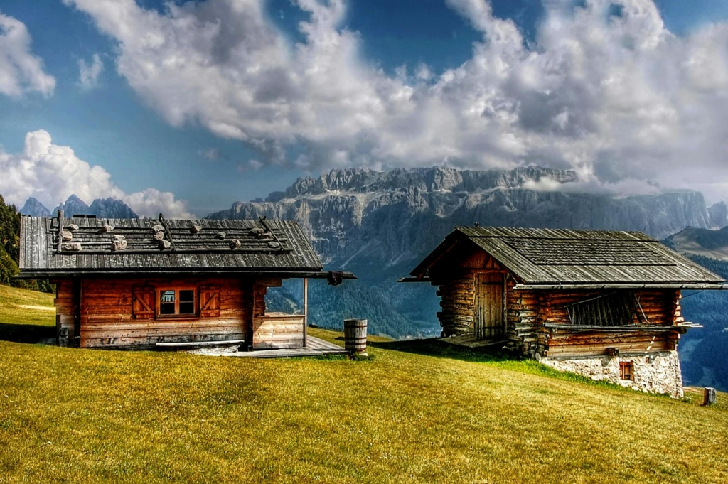 house near mountain cliff