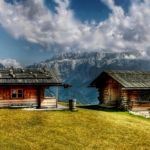 house near mountain cliff