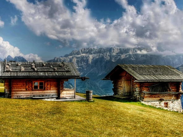 house near mountain cliff